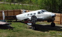 N702FY @ 95Z - Stored C-45 sits in a private lot just off Bradley Skyranch , North Pole , AK - by Terry Fletcher