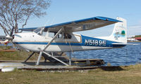 N5189E @ LHD - A Cessna 180B of Skeeter Air sits in the Lake Hood sunshine - by Terry Fletcher