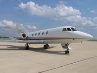 N6VF @ KDPA - on the ramp at DuPage - by Tom Cooke
