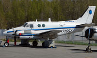 N7165Y @ ANC - Beech 65-A90-1 of Arctic Circle Air at Anchorage South Ramp - by Terry Fletcher