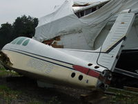N3667B - Another T-Bone that had a sad ending! Now being used for parts to repair another Twin Bonanza that was damaged in a ground incident. - by Gregg Cadieux