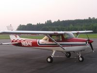 N1914F @ SIF - at the self-serve pump....over $100 and still not topped off - by Tom Cooke
