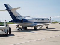 N168WU @ LNK - CLEANING THE POO TANK - by Gary Schenaman