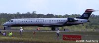 N706PS @ ILM - A full people-tube making her way out