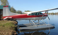 N61438 @ LHD - Cessna A185F on dock at Lake Hood - by Terry Fletcher
