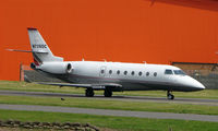 N726DC @ EGGW - Smart looking Gulfstream G200 departs Luton - by Terry Fletcher