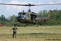 N426HF @ ILM - Ground guiding her in for a refuel