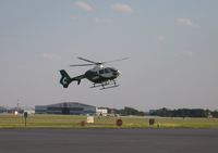 N135N @ KGSO - medivac Eurocopter 135 approaching Landmark Aviation - by Tom Cooke