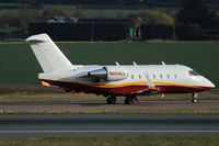 N604LL @ EGGW - Bombardier CL600-2B16 - by robert starling