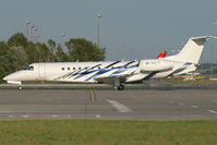 M-YNJC @ VIE - NewJet Co. Embraer 135 - by Thomas Ramgraber-VAP