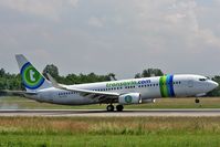 PH-HZO @ LFSB - Transavia Boeing 737-800 arriving from AMS EURO 08 - burning rubber - by runway16