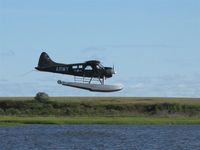 N734Q @ Z58 - Approach to Hangar Lake - by Martin Prince, Jr