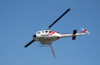 N498DF - CDF Bell UH-1H Helitak 406 working fire off of State Hwy 68 ~ 4 miles NE of Monterey, CA - by Steve Nation