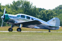 N34SE @ N51 - Gleaming elegance: Mrs. Mennen touches down at Solberg Airport. - by Daniel L. Berek