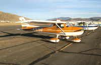 N7675G @ CXP - 1973 Cessna 150L with Wyoming cowboy tail logo @ Carson City, NV - by Steve Nation