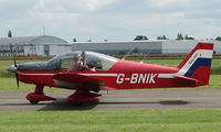 G-BNIK @ EGBW - Robin on a sunny Sunday afternoon at Wellesbourne - by Terry Fletcher