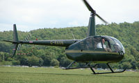 G-RAVN @ EGBW - Robinson R44 on a sunny Sunday afternoon at Wellesbourne - by Terry Fletcher