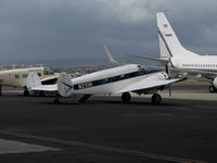 N231H @ HNL - Kamaka Air (no titles) cargo 1957 Beech E18S @ Honolulu, HI - by Steve Nation