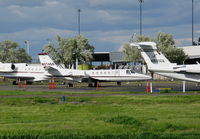 N374QS @ SMF - NetJets 1998 Cessna 560 @ Sacramento Intl, CA - by Steve Nation