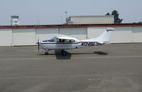 N1349U @ STS - A rare piston powered 1975 Cessna T210L taxying out at home base of 210 Silver Eagle Turbo shop @ Santa Rosa, CA - by Steve Nation