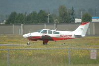 N215DR @ S50 - awaiting clear runway - by Wolf Kotenberg