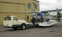 N4994F @ LHD - Cessna U206B at Lake Hood with the unusual looking towing equipment - by Terry Fletcher