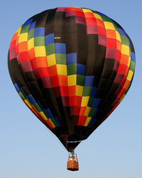 N8066P @ N51 - A group of lucky sightseers embark on a memorable trip aboard this colorful balloon. - by Daniel L. Berek