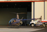 N828SH @ OAK - Lift-off sequence of now defunct Silver State Helicopters 2005 Robinson Helicopter R22 BETA crew training in late afternoon sun @Oakland, CA - by Steve Nation