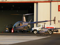 N828SH @ OAK - Lift-off sequence of now defunct Silver State Helicopters 2005 Robinson Helicopter R22 BETA crew training in late afternoon sun @Oakland, CA - by Steve Nation