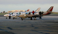 N35336 @ OAK - (Odd-ball colors) Ameriflight 1979 Piper PA-31-350 freighter with her 'sisters' in late afternoon sun @Oakland, CA - by Steve Nation