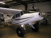 N180MX @ KLVN - Parked inside the hangar. - by Mitch Sando