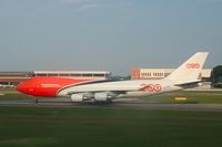 OO-THA @ WSSS - TNT taxiing to the runway for take-off - by Michel Teiten ( www.mablehome.com )
