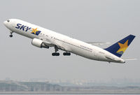JA767F @ RJTT - Skymark - by Christian Waser