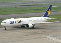 JA767B @ RJTT - Skymark - by Christian Waser