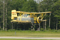 N6671Q @ CGE - Landing at Cambridge MD airport - by J.G. Handelman