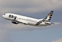 TC-SKD @ EDDL - Climbing from rwy 23L through impressive clouds. - by Philippe Bleus