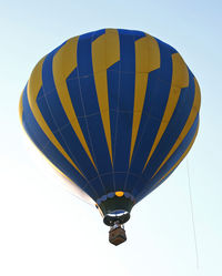 N52972 @ N51 - A long way from its Florida home, this blue-and-yellow balloon lifts off into a hazy New Jersey summer sky. - by Daniel L. Berek