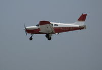 N2321M @ SQL - 1977 Piper PA-28-161 shooting touch-n-goes in smoky conditions @ San Carlos, CA - by Steve Nation