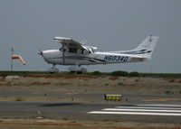 N6034D @ SQL - 2006 Cessna 172S landing in smoky conditions @ San Carlos, CA - by Steve Nation