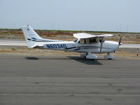 N6034D @ SQL - 2006 Cessna 172S taxying in smoky conditions @ San Carlos, CA - by Steve Nation