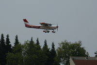 N24342 @ HWD - 1977 Cessna 152 landing in smoky conditions @ Hayward Air Terminal, CA - by Steve Nation