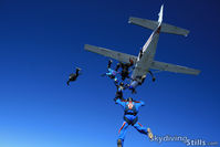 N9479B @ 7B9 - A group of skydivers exits the Caravan over Connecticut Parachutists, Ellington, CT - by Dave G