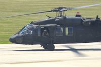 84-24022 @ CID - EH-60A taxiing for departure, seen from my office window