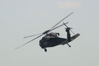 84-24022 @ CID - EH-60A climbing out after departure