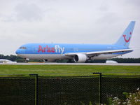 PH-AHQ @ EGCC - runway 23R departure - by chrishall