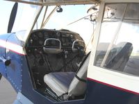 N1410H @ DLZ - Left side door swings up and the right side swings forward.  It was built with metal wings and has float fittings.
