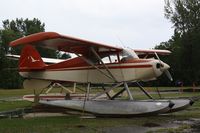 N5788H @ 8Y4 - Tied down at Surfside Seaplane Base.  Herman the Duck from North Central Airlines, the Republic Airlines on the tail. - by Timothy Aanerud