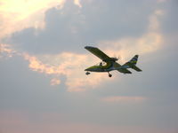 N9080R - flying over lake erie - by Timothy Dougherty