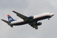 N419US @ MCO - US Airways 737-400 arriving from CLT