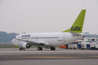 YL-BBM @ LIMC - At Milan Malpensa - by Steve Hambleton